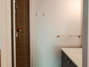 a bathroom with a shower and a sink at Spacieux appartement 3 pièces au centre de Flaine - FR-1-425-28 in Flaine +11 photos