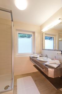 Koupelna v ubytování Alpenhotel Neuwirt