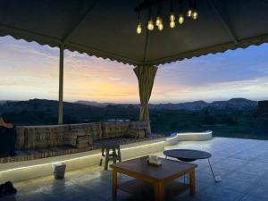 a living room with a couch and a table at دور سياحي in Abha