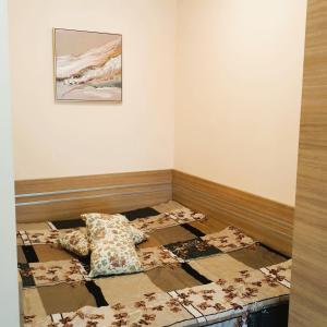 a room with two beds and a picture on the wall at Студио Стайл - Соренто Соле Маре in Sveti Vlas +14 photos