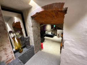 a view of a room with a brick fireplace at gleisbett12-4 in Meiningen