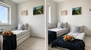 a living room with two beds and a window at Aura Home in Grywałd