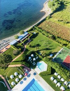 an aerial view of a resort next to the water at Loft Open Space, Capoliveri Centralissimo in Capoliveri