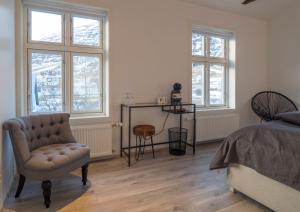 Posezení v ubytování Við Lónið Guesthouse