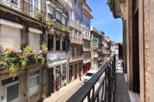a view of a city street from a balcony at Chateau Belomonte in Porto