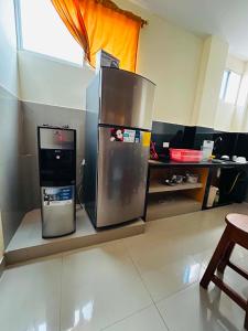 two refrigerators sitting on a counter in a room at CASA Sebastián in Puerto Baquerizo Moreno