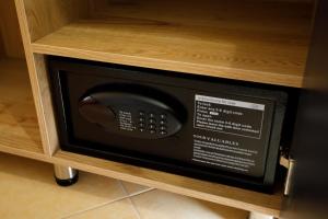 a microwave oven sitting in a drawer in a cabinet at Panorama Hills Entire Villa in Gjirokastër