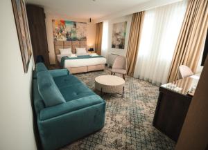 Llit o llits en una habitació de Hotel Leskovac