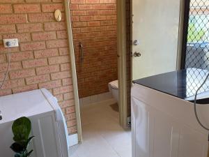 a bathroom with a sink and a toilet in a room at Entire 2 bedrooms unit in Geraldton +8 photos