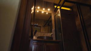 a bathroom with a sink and a mirror at Verde Luna in San Francisco +39 photos