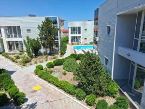 an aerial view of a garden outside a building at Apartamente VILLA 7 On The Beach in Eforie Nord