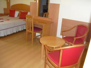 Cama ou camas em um quarto em Hotel Solneve