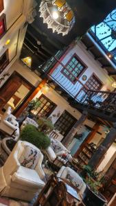 an overhead view of a living room with couches at Hotel Cantuña in Quito