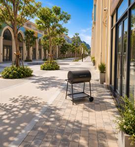 a barbecue grill sitting on the side of a street at Sonasea Vân Đồn - Centraltique Seaside in Quang Ninh