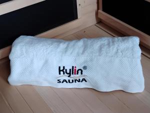 a towel that says kittin samma on a door at Romantic Ocean View Studio at Stanwell Tops in Stanwell Park
