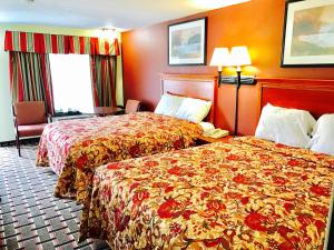 Katil atau katil-katil dalam bilik di Greystone Motel