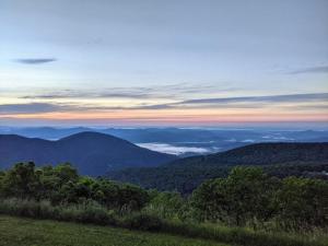 a view of the mountains with clouds in the distance at Panoramic Peak in Mount Torry Furnace