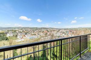 a balcony with a view of a city at 85Centro in Potenza