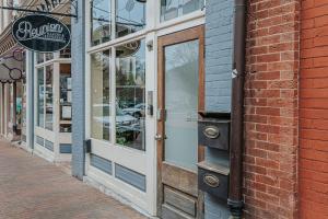 a door to a store on a street at The Social Loft in Staunton