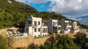 an aerial view of a house on a hill at Kalma Luxury Villas in Kalamata