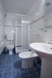 Ванна кімната в Apartments AVA