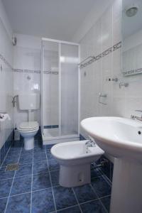 Koupelna v ubytování Apartments AVA + 37 fotografií
