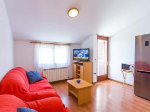 TV a/nebo společenská místnost v ubytování Apartments AVA
