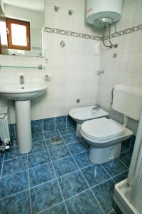 Koupelna v ubytování Apartments AVA