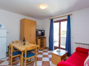 Kuchyň nebo kuchyňský kout v ubytování Apartments AVA