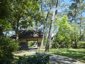 Aed väljaspool majutusasutust Numazu Club