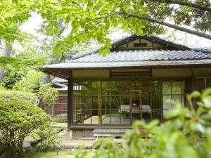 Aed väljaspool majutusasutust Numazu Club