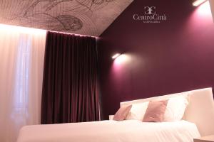 Postel nebo postele na pokoji v ubytování Centro Città Luxury B&B