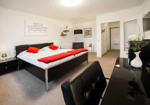 Postel nebo postele na pokoji v ubytování Eilenriedestift Hotel + 21 fotografií