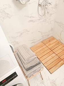a towel rack in a bathroom with a shower at Luxury Studio with Balcony in Sunny Beach