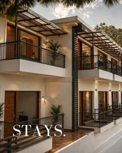 a rendering of a house with the words stays at Ventus Pines in Kasauli +37 photos