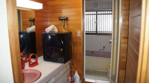 a bathroom with a washing machine and a sink at つむぐ家2 in Ueda +26 photos