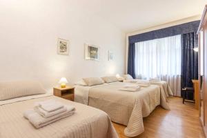 מיטה או מיטות בחדר ב-Kosher Bed&Breakfast La Casa di Eva 