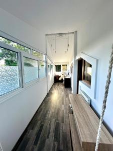 a room with a rope swing in a house at Casuta Irinei in Gura Vadului