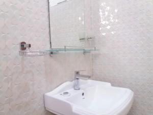 Kúpeľňa v ubytovaní Dinaro Guest