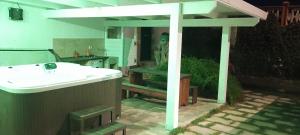a bathroom with a white sink and aentedentedophe at Chalet Gallipoli in Gallipoli +42 photos