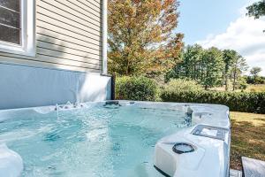 a hot tubificialificialificialificialificialificialificialificialificialificialificialificialificial at Clonmel Acres in Afton