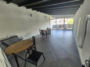 a dining room with tables and chairs in a building at Aqua Sia in Sighetu Marmaţiei