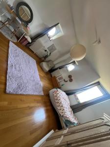 an overhead view of a room with a bed and a window at Chez Léopold II in Verviers +17 photos