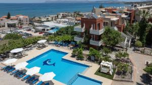 an aerial view of a resort with a swimming pool at Ekavi Apartments in Agia Marina Nea Kydonias