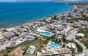 an aerial view of a town next to the ocean at Ekavi Apartments in Agia Marina Nea Kydonias