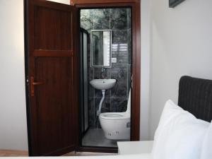 a bathroom with a toilet and a sink at Terrace Hotel in Istanbul +24 photos