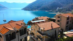 an aerial view of a town with a large body of water at Bellezza Residence & Spa Kotor in Donji Morinj