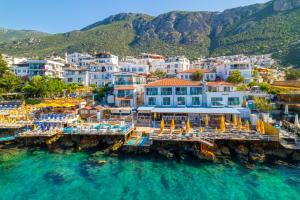 an aerial view of a town on the water at The Kaş Otel in Kaş