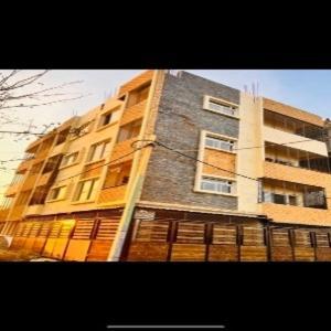 a tall building with a fence in front of it at Kejriwals Vaikunth 35A in Bangalore