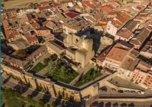 an aerial view of a city with a building at Albergue Izar in Viana